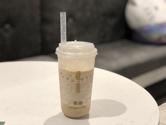 Bubble milk tea with yogurt popping boba.