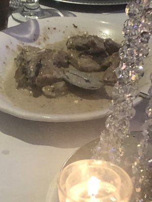 This is a plate of pieces of "filet mignon" served to the guest. NASTY who serves food like this.