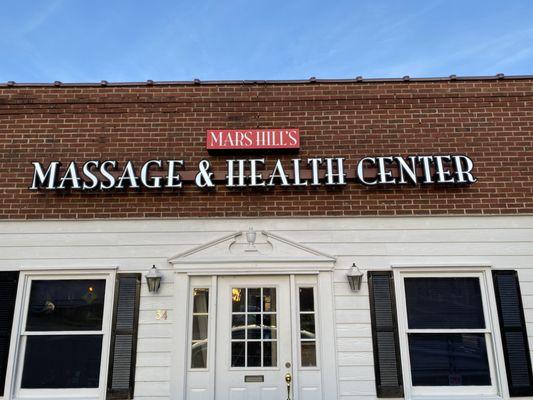 The yoga wellness center is located inside of the 'Mars Hill's Massage & Health Center'