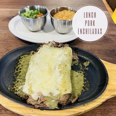 Two pork enchiladas topped with
Salsa verde & your choice of two sides