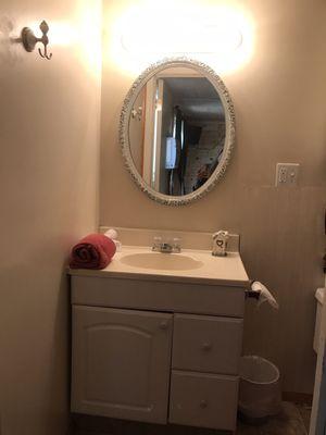 Cabin 12's updated vanity.. the mirror is too cute!