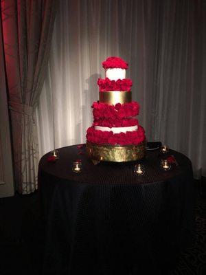 Gold and white almond cream wedding cake