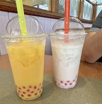 Mango bubble tea with strawberry poppers and coconut bubble tea with strawberry poppers. SO GOOD.