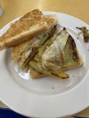 Home made bread toasted with hot Demus sausage and fried hot peppers and melted mozzarella cheese.