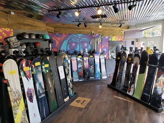 Snowboards in store at our University District Storefront.