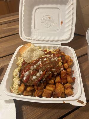 Cheeseburger plate with Mac salad and home fries.