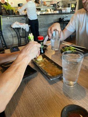 Fighting over the last Shrimp Shumai! Favorite dish