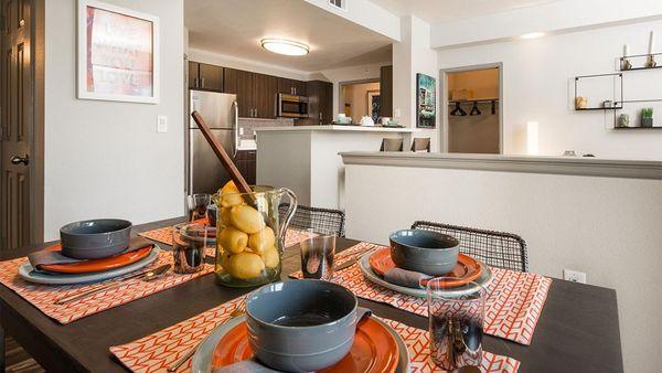 Apartment Dining room with wood floors.