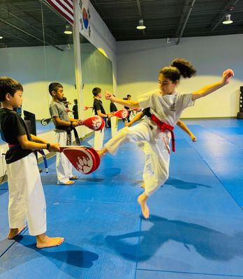 Kids training in Syosset at Masters Martial Arts.