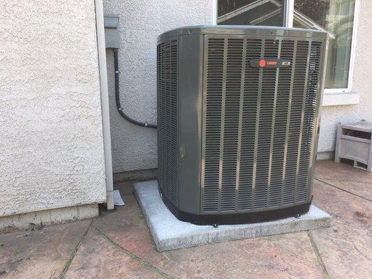 4.0 ton  trane split system a/c condenser  in backyard Fairfield job