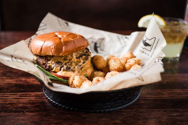 French Quarter - CAB Burger Seasoned with Cajun Rub, grilled & topped with bibb lettuce, tomato, remoulade dressing.