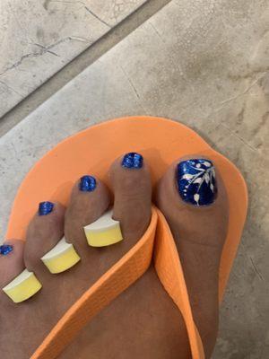 Pedicure with standard toe polish and design.