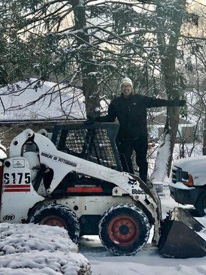 Dom helping his neighbors with snow removal!