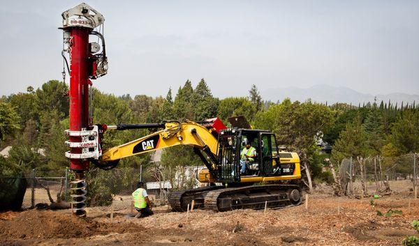 No project is too large. Here we are drilling footings for a large solar array.