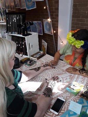 Karina doing some henna for me at Halana's Psychic Fair.