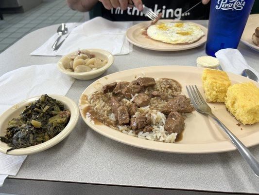 Beef tips and rice, turnip greens, Lima beans and cornbread