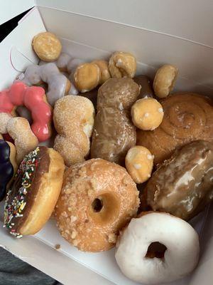 Box filled with variety of donuts