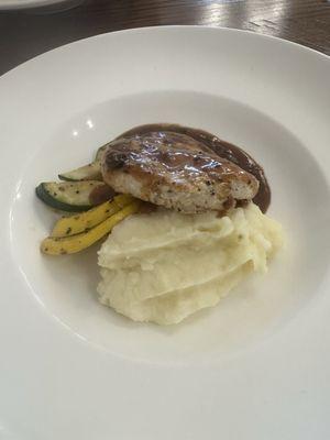 Chicken Marsala, mashed potatoes with squash and zucchini