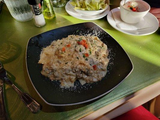 Pappardelle - Wide flat herb infused pasta with wild boar and porcini mushroom sauce.