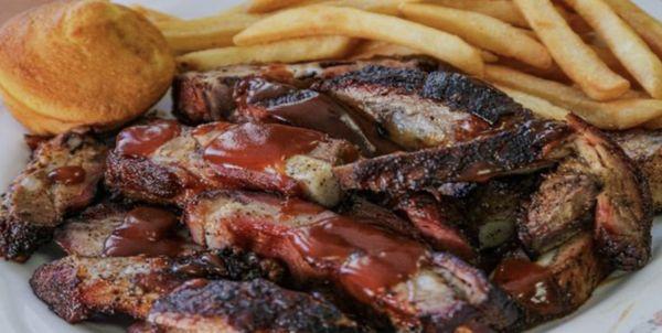 Barbecued Pork Ribs, French fries and corn bread.