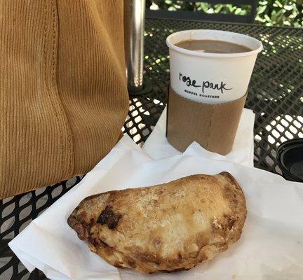 Curry empanada and coffee.