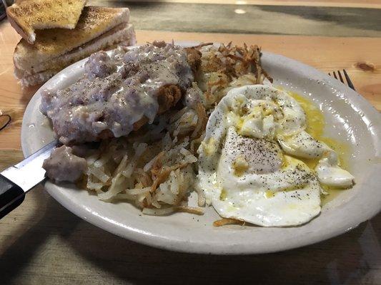 Chicken Fried Steak, hash browns, eggs, and sausage gravy.