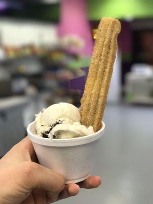 Churro with some Ice cream come an get one