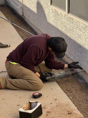 Securing the conduit to the stemwall.