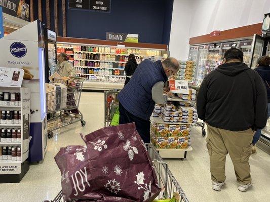 ShopRite's isles are cluttered with mid-isle displays and clerks packing merchandise.  It can be hard to get around with a cart.