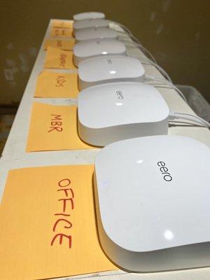 Setting up eero mesh networks for clients; it's what we do. Updating firmware and testing before deployment.