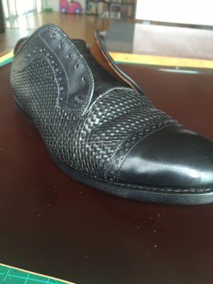 Repaired basket weave shoe.