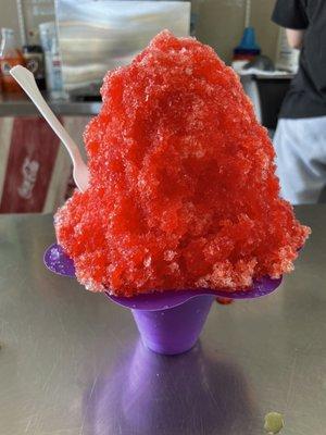 Tigers blood shaved ice with a scoop of ice cream underneath