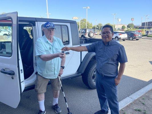 My dad getting his keys to his new Jeep Gladiator