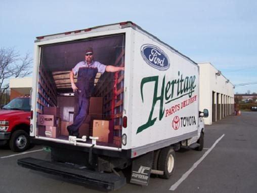 H-Team member, Charlie is pictured on the back of a few of our trucks