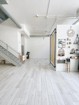 An eclectic yoga studio with open space and cute nooks.