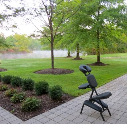 on-site chair massage on a lovely summer day