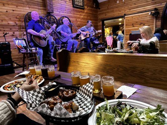 The Abbey has great craft beer, awesome atmosphere, friendly staff, and it sits by a white water mountain river.