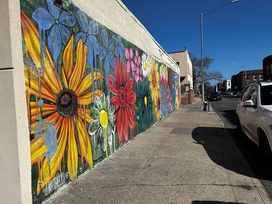 Beautiful painting on the side of the building.