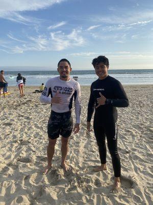 Surf Coach and Student after a great surfing lesson