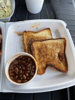 Sides: Baked beans and Texas toast.