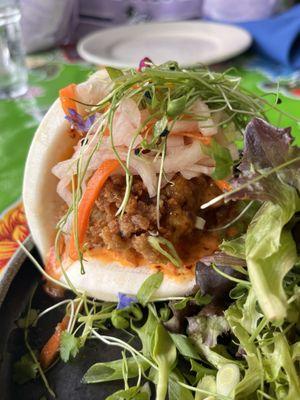 Close-up of the amazing Fried Oyster Bao. Just looking at it makes my mouth water.