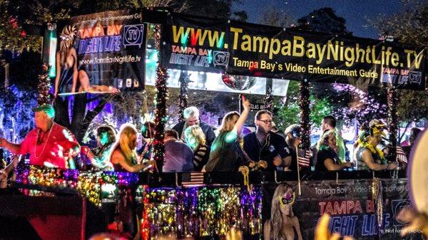 Our float rolling through downtown Dunedin in their annual Mardi Gras Parade..