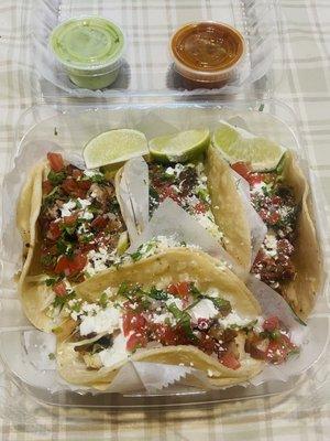 Bistec , Carne Enchilada , chicken, and carnita tacos.