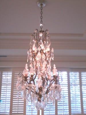 Another beautiful chandelier installation.  Installed recessed accent lights above it to better illuminate the crystals.