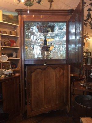 This Antique Cabinet required lots of mirrors & glass shelving to convert it into bar.