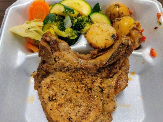 Pork Chop W/Steamed Veggies And Potatoes.