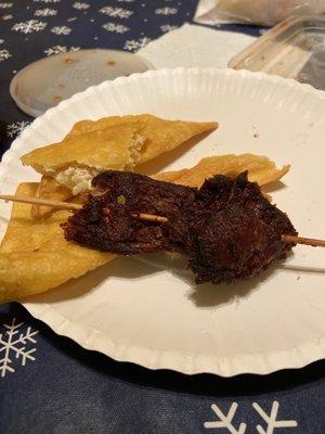 Chicken in a stick and fried crab Rangoon