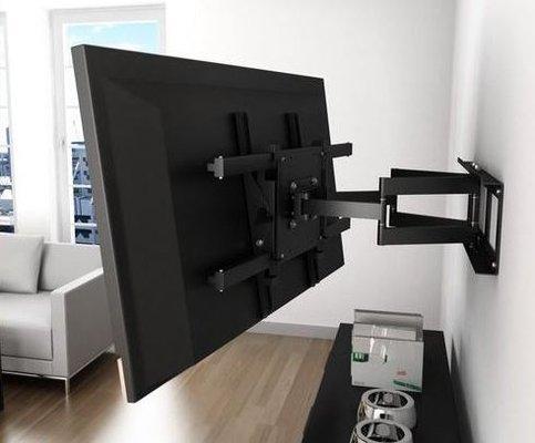 Mounting a TV bracket to the wall.