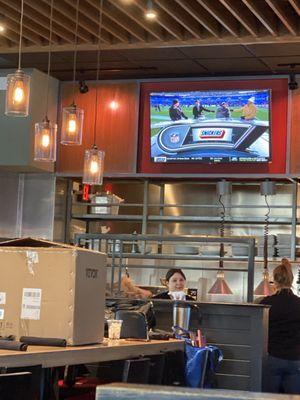 Weird box on table and open kitchen concept in the background