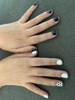 My daughter's black and white nails! So cute!!